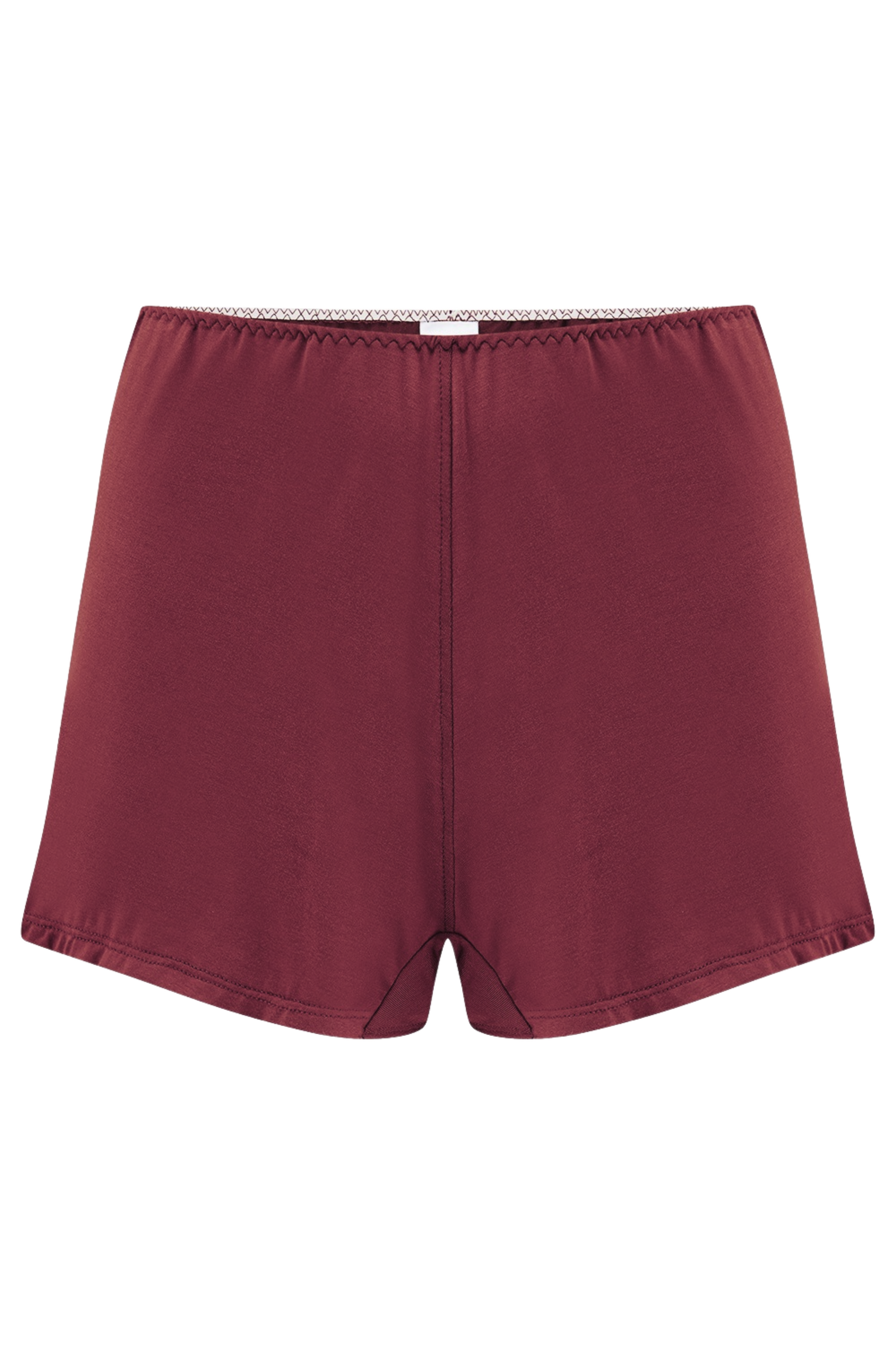 Burgundy shorts against a neutral background - made from sustainable Austrian micromodal from beech trees. Handcrafted in England
