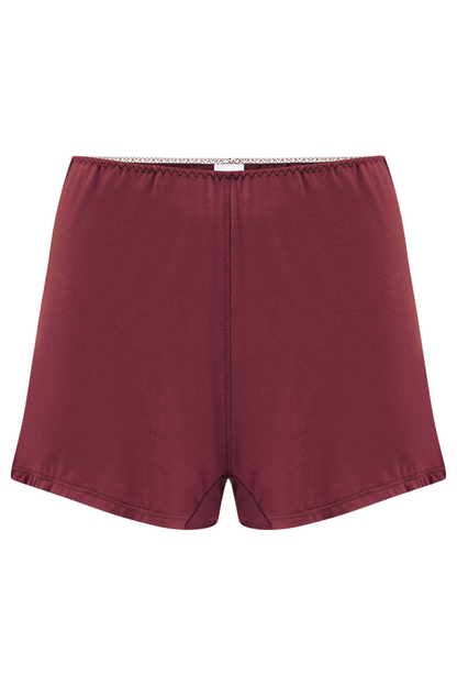 Burgundy shorts against a neutral background - made from sustainable Austrian micromodal from beech trees. Handcrafted in England