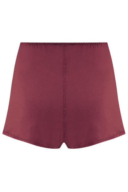 Burgundy shorts against a neutral background - made from sustainable Austrian micromodal from beech trees. Handcrafted in England