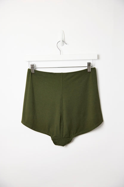 Dark olive Cosy Charlotte shorts hanging on a white clip hanger, closer view against a plain white background