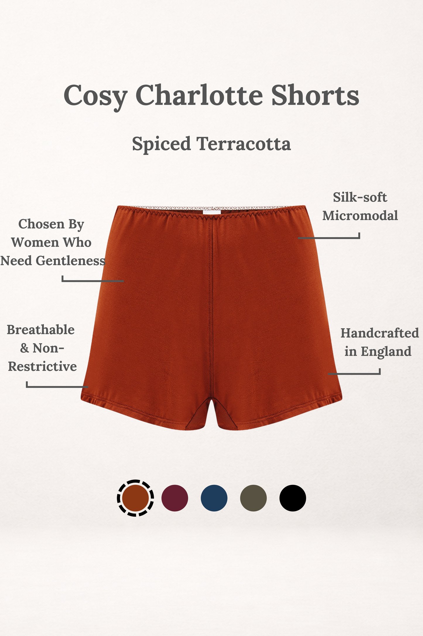 Spiced Terracotta Cosy Charlotte shorts with annotated product details, including silk-soft micromodal, handcrafted in England, and breathable, non-restrictive design, on a white background.