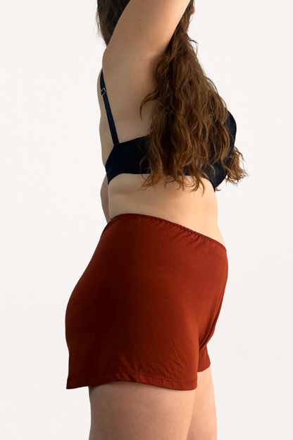 Cosy Charlotte shorts in spiced terracotta - made from supersoft Austrian micromodal jersey from trees and made in England. 