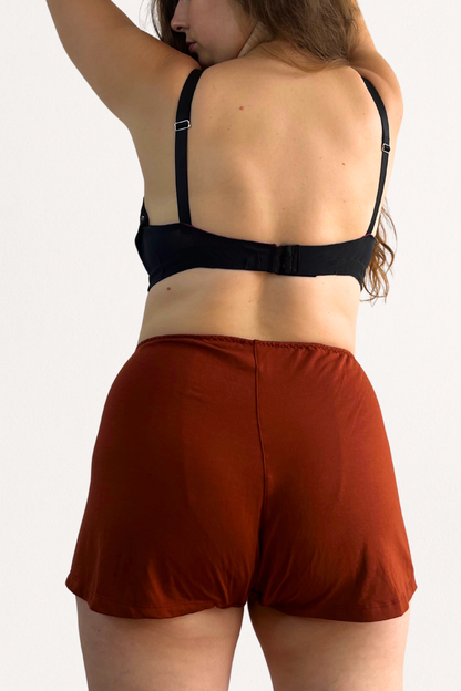 Cosy Charlotte shorts in spiced terracotta - made from supersoft Austrian micromodal jersey from trees and made in England. 