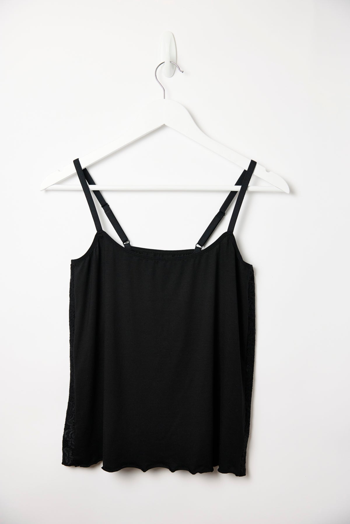 Cuurve Sweet Sienna cami top, black lyocell jersey, front view on hanger