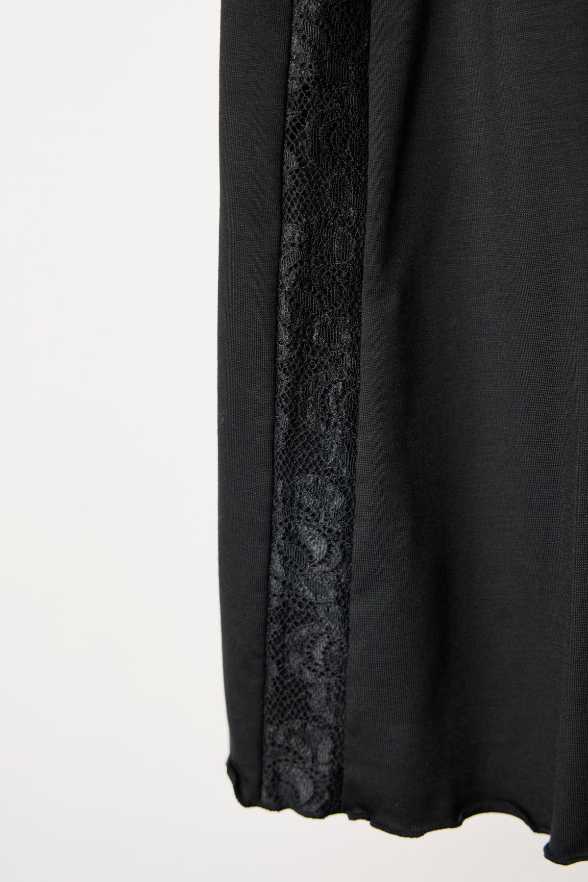 Close-up of the Cuurve Sweet Sienna cami neckline, lace trim detail