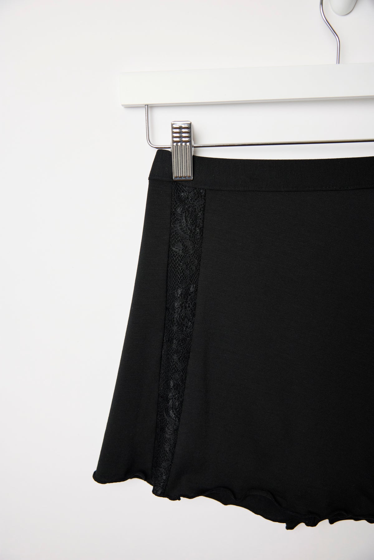 Cuurve Sweet Sienna shorts with ruffle hem detail, flat lay